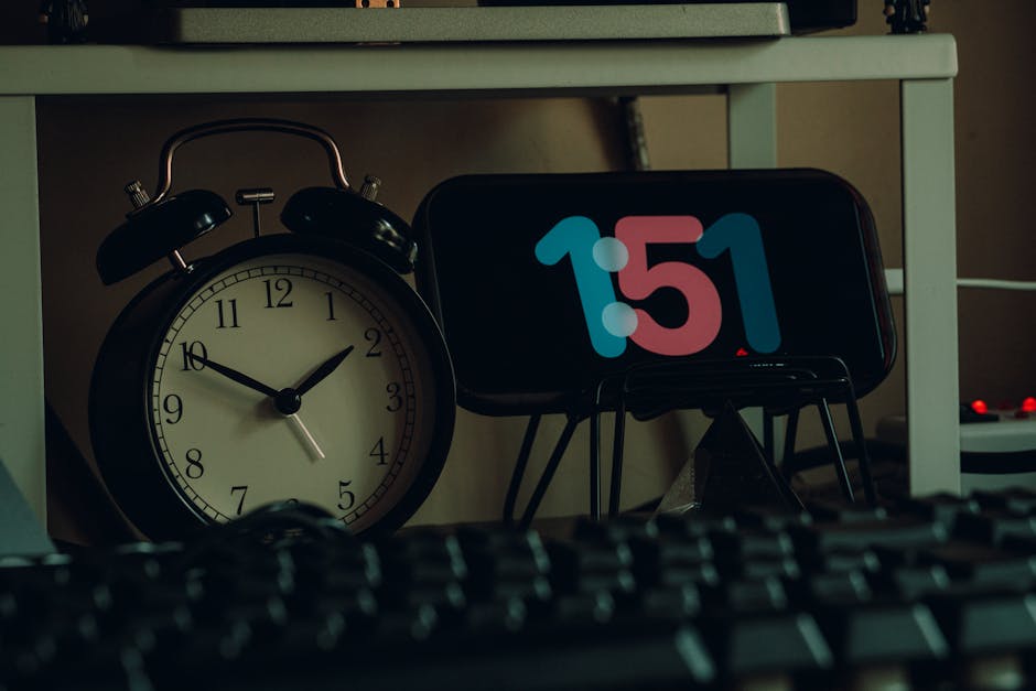 A creative workspace featuring both modern and vintage clocks, enhancing desk decor.